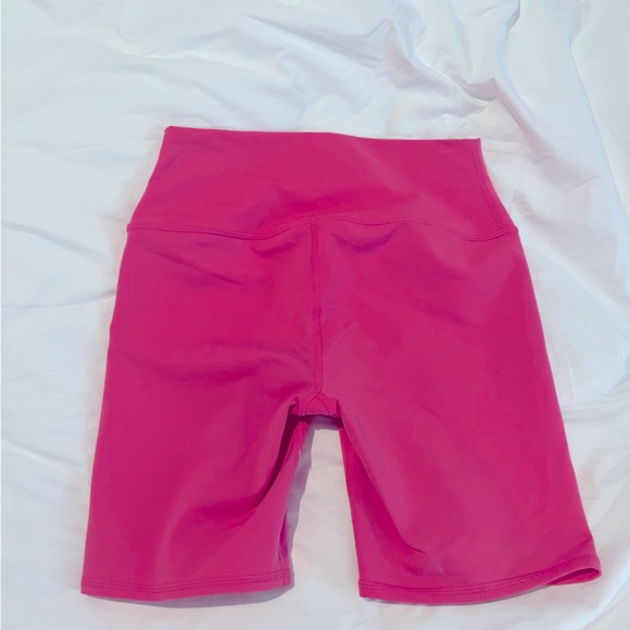 Alo Yoga High Waist Biker Shorts in Pink Fuchsia - Picture 2 of 6